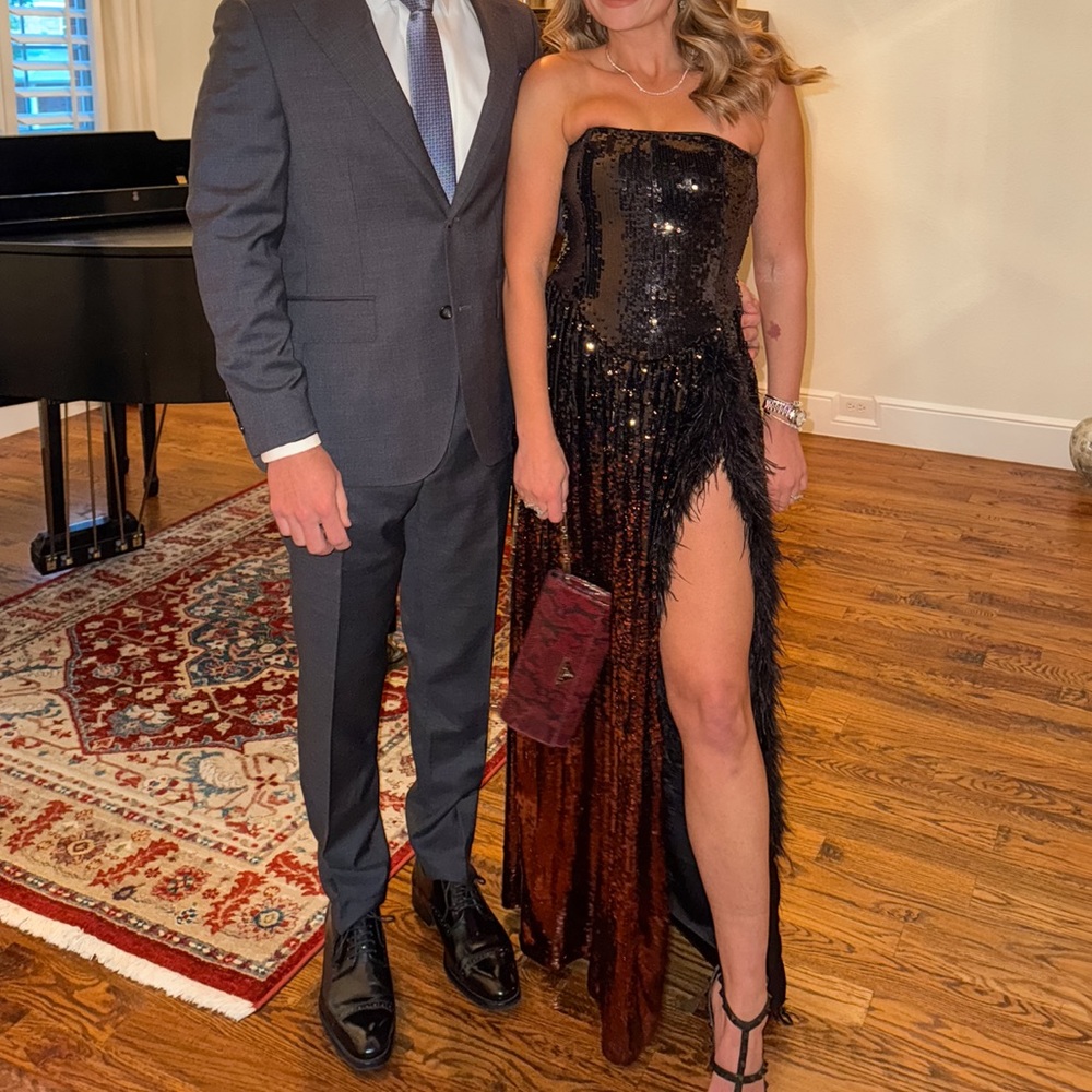Custom Sequin corset feathered gown